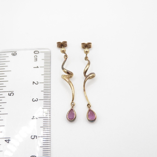 114 - 9ct gold pink sapphire spiral drop earrings (3g)