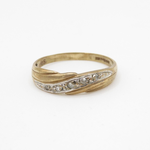 133 - 9ct gold diamond set band ring (1.7g) Size P 1/2