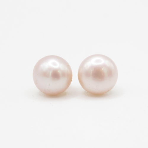 143 - 14ct gold cultured pearl stud earrings (2.2g)