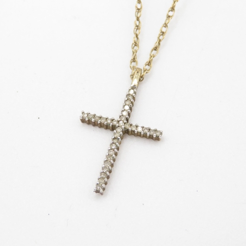 196 - 9ct gold and diamond cross pendant on chain (2.7g)