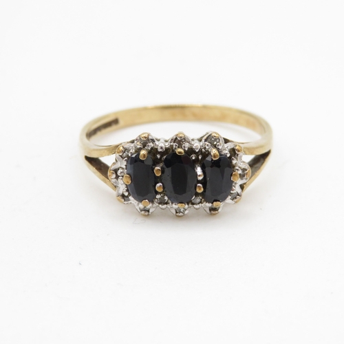 199 - 9ct gold sapphire and diamond trilogy halo ring (2.3g) Size P