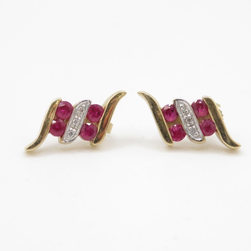 90 - 9ct gold ruby and diamond stud earrings (4.3g)