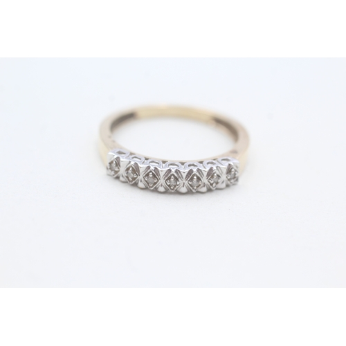 103 - 9ct gold diamond row ring (2.1g) Size P