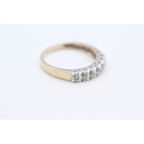 103 - 9ct gold diamond row ring (2.1g) Size P