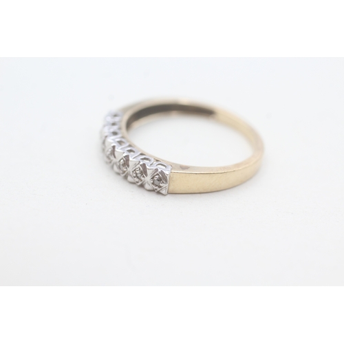 103 - 9ct gold diamond row ring (2.1g) Size P