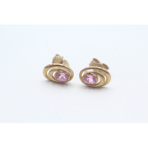 106 - 9ct gold pink sapphire stud earrings (1.4g)