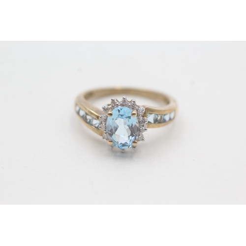 110 - 9ct gold blue topaz & diamond dress ring (2.7g) Size N 1/2