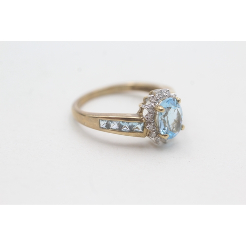 110 - 9ct gold blue topaz & diamond dress ring (2.7g) Size N 1/2