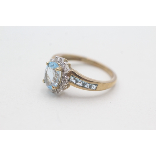 110 - 9ct gold blue topaz & diamond dress ring (2.7g) Size N 1/2