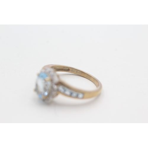 110 - 9ct gold blue topaz & diamond dress ring (2.7g) Size N 1/2