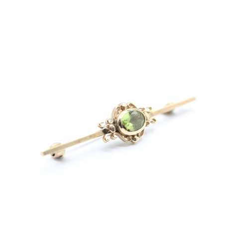 124 - 9ct gold vintage peridot brooch (3.4g)