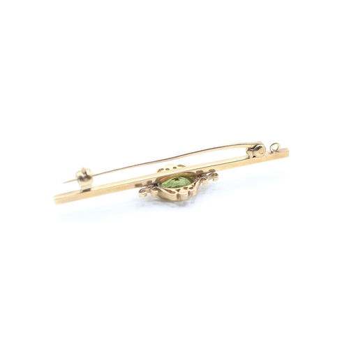 124 - 9ct gold vintage peridot brooch (3.4g)