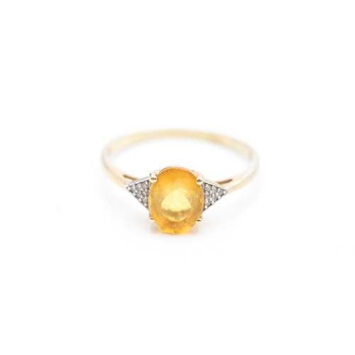 127 - 9ct gold diamond and citrine set dress ring (1.9g) Size U