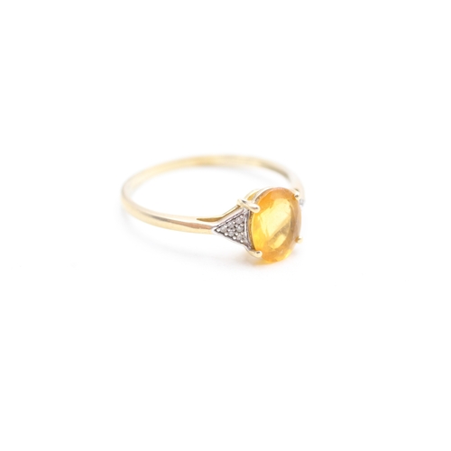 127 - 9ct gold diamond and citrine set dress ring (1.9g) Size U