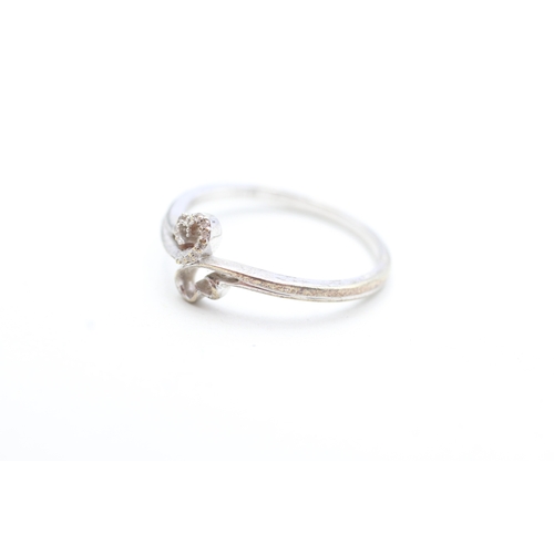 128 - 9ct gold diamond double heart ring (2.3g) Size Q