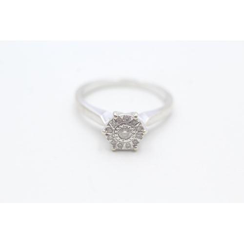 141 - 9ct white gold diamond set cluster ring (3.1g) Size P