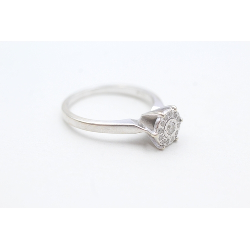 141 - 9ct white gold diamond set cluster ring (3.1g) Size P