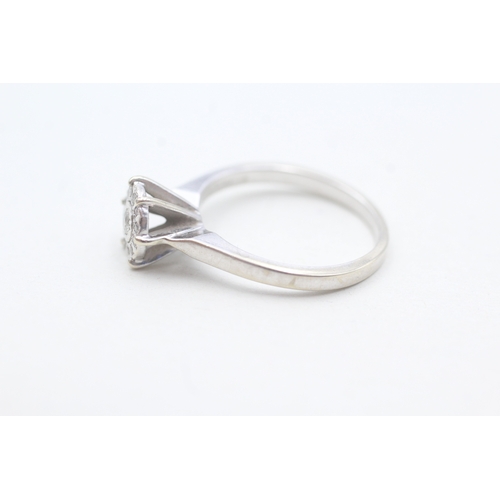 141 - 9ct white gold diamond set cluster ring (3.1g) Size P