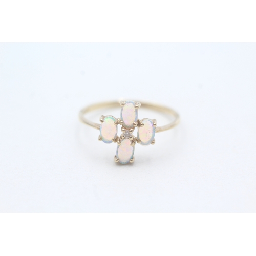 148 - 9ct gold opal and diamond set ring (1.1g) Size O