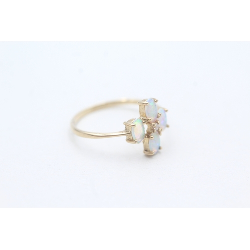 148 - 9ct gold opal and diamond set ring (1.1g) Size O