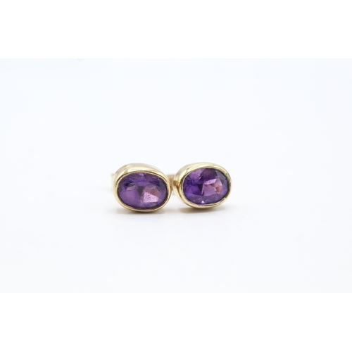 164 - 9ct gold amethyst stud earrings (2.1g)