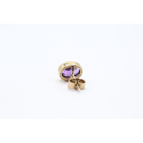 164 - 9ct gold amethyst stud earrings (2.1g)