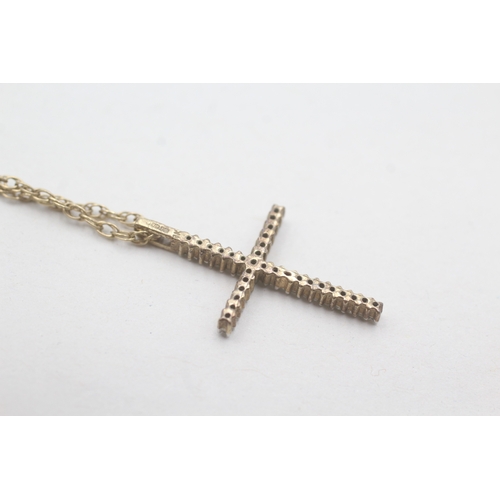 196 - 9ct gold and diamond cross pendant on chain (2.7g)