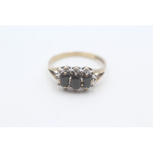 199 - 9ct gold sapphire and diamond trilogy halo ring (2.3g) Size P