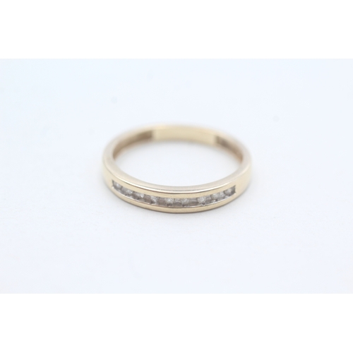 205 - 9ct gold diamond channel setting row ring (1.6g) Size P