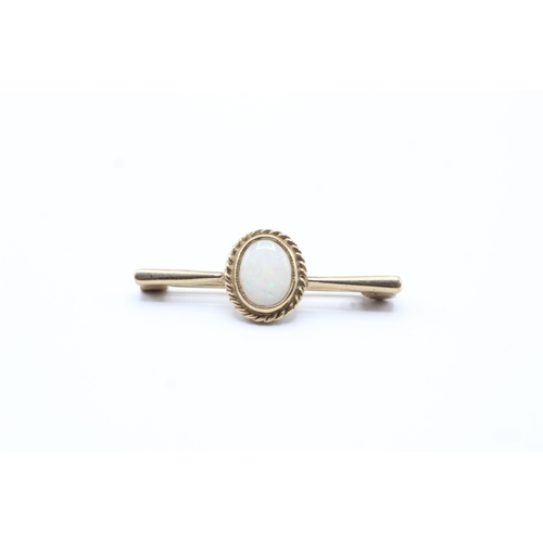 221 - 9ct gold opal brooch (1.8g)