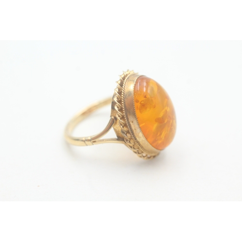 225 - 9ct gold amber cocktail ring (4g) Size P