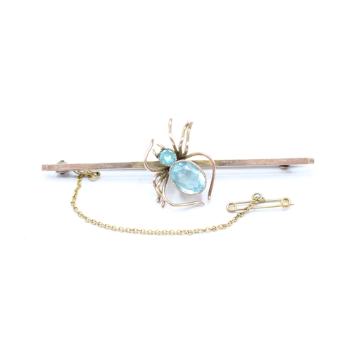 230 - 9ct gold paste spider bar brooch (4.4g)