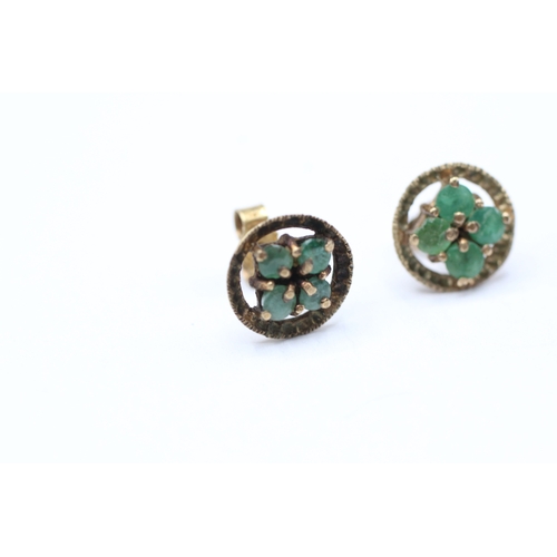 237 - 9ct gold emerald four stone stud earrings (1.6g)