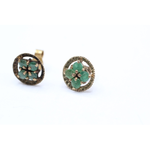 237 - 9ct gold emerald four stone stud earrings (1.6g)