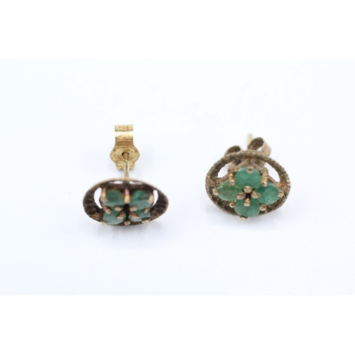 237 - 9ct gold emerald four stone stud earrings (1.6g)