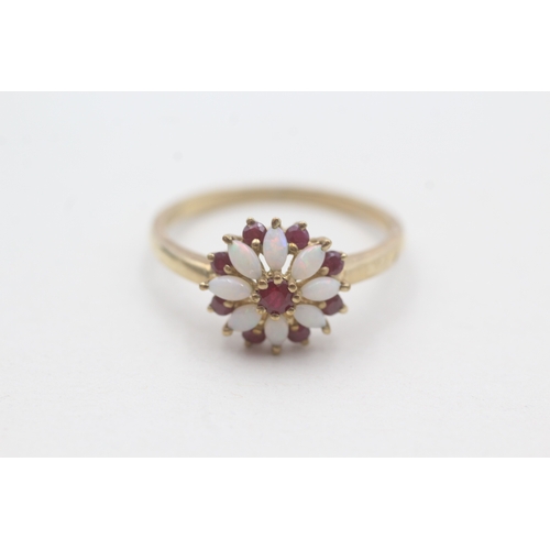 29 - 9ct gold ruby & opal floral dress ring (2.8g) Size V