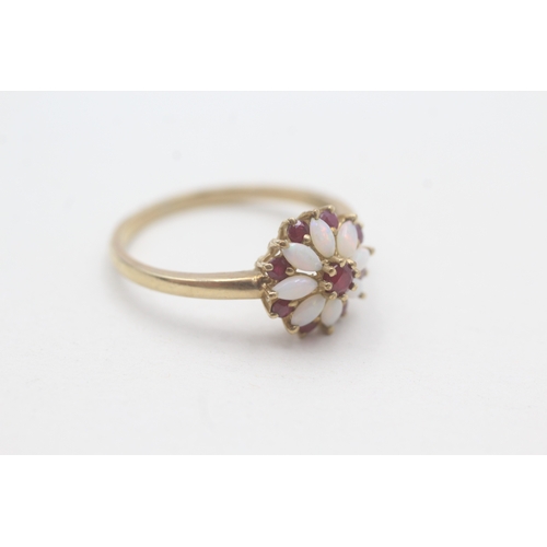 29 - 9ct gold ruby & opal floral dress ring (2.8g) Size V