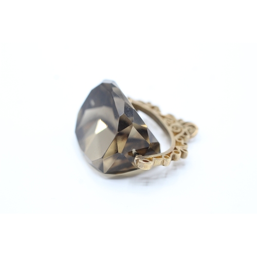 3 - 9ct gold smokey quartz swivel fob (24g)