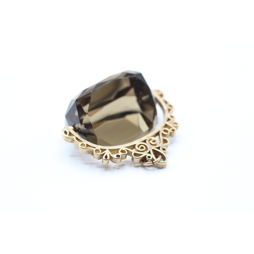 3 - 9ct gold smokey quartz swivel fob (24g)