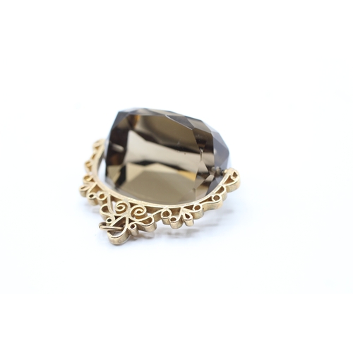 3 - 9ct gold smokey quartz swivel fob (24g)