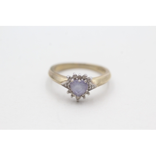 39 - 9ct gold tanzanite & diamond dress ring (2.7g) Size L