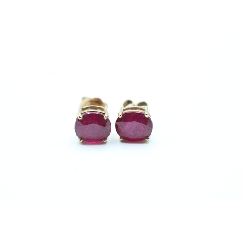 44 - 9ct gold glass filled ruby stud earrings (2g)