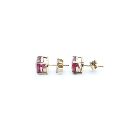 44 - 9ct gold glass filled ruby stud earrings (2g)