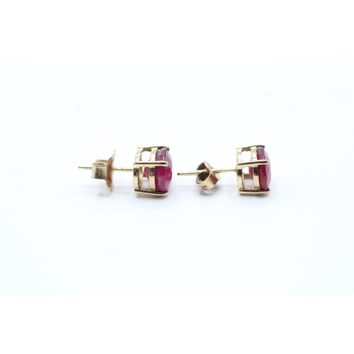 44 - 9ct gold glass filled ruby stud earrings (2g)