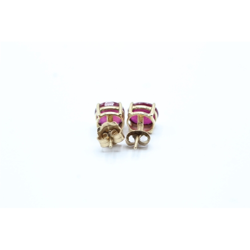 44 - 9ct gold glass filled ruby stud earrings (2g)