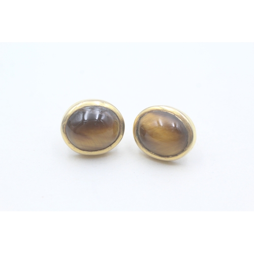 49 - 9ct gold tigers eye stud earrings (5.4g)