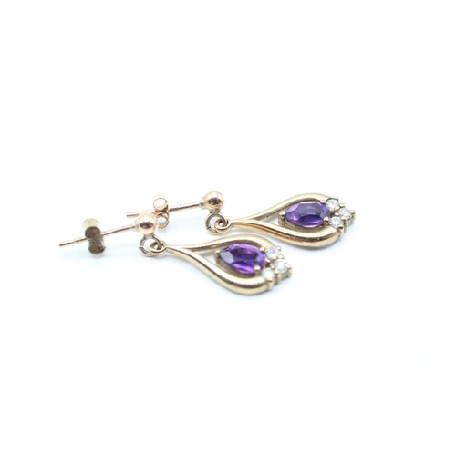 61 - 9ct gold amethyst & diamond drop earrings (2g)