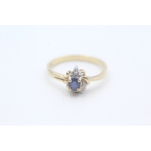 62 - 14ct gold sapphire and diamond ring (2.3g) Size N