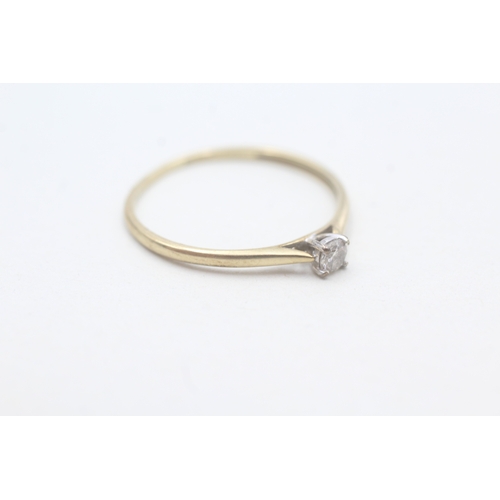 66 - 9ct gold solitaire diamond ring (1g) Size U 1/2