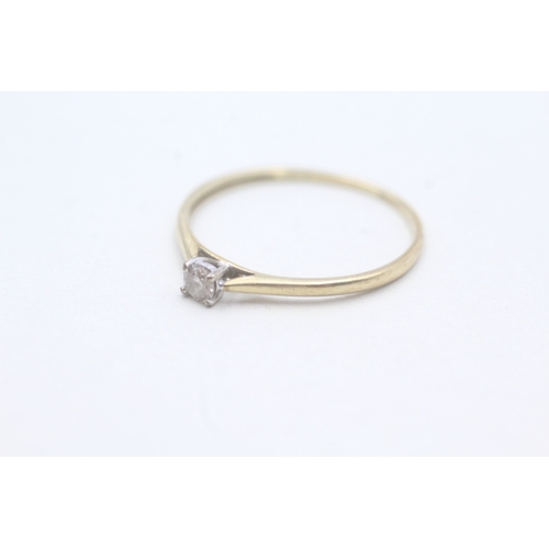 66 - 9ct gold solitaire diamond ring (1g) Size U 1/2